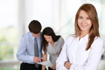 tile-business-woman-with-meeting-in-background